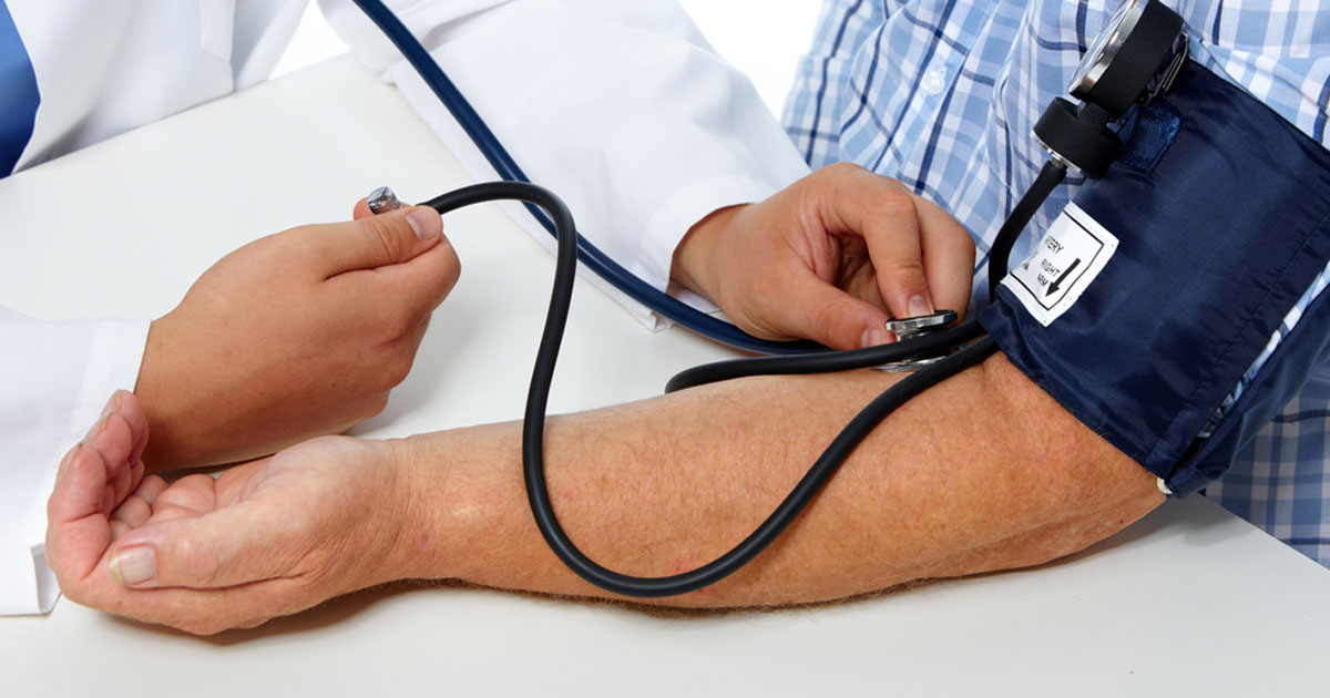 patient getting blood pressure checked