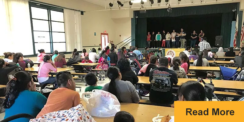 Immigrant families in Ventura County listen during a community meeting