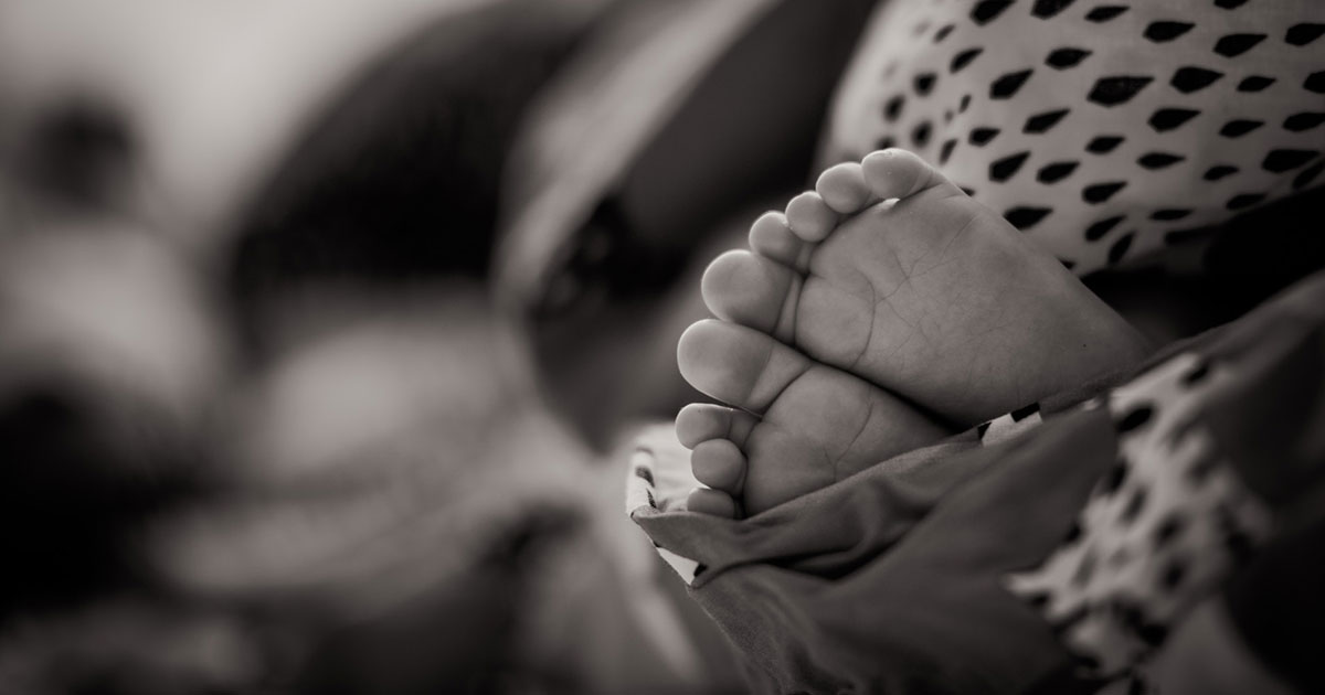 Baby feet by Janko Ferlic via Unsplash