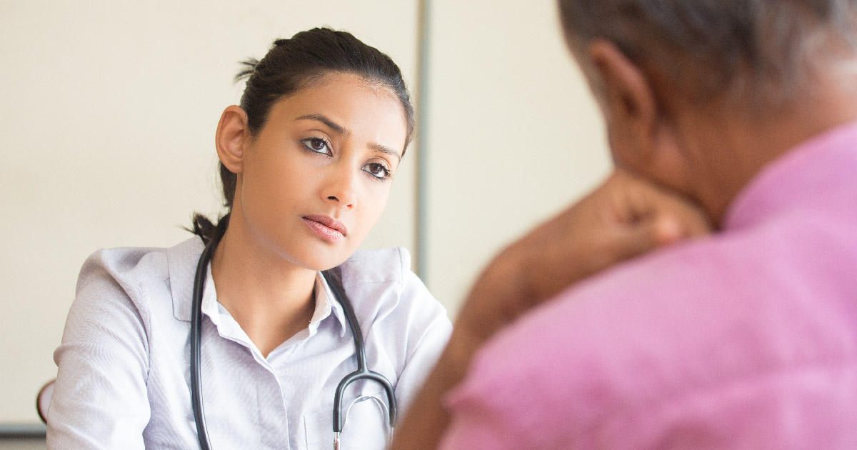 Doctor discussing with patient