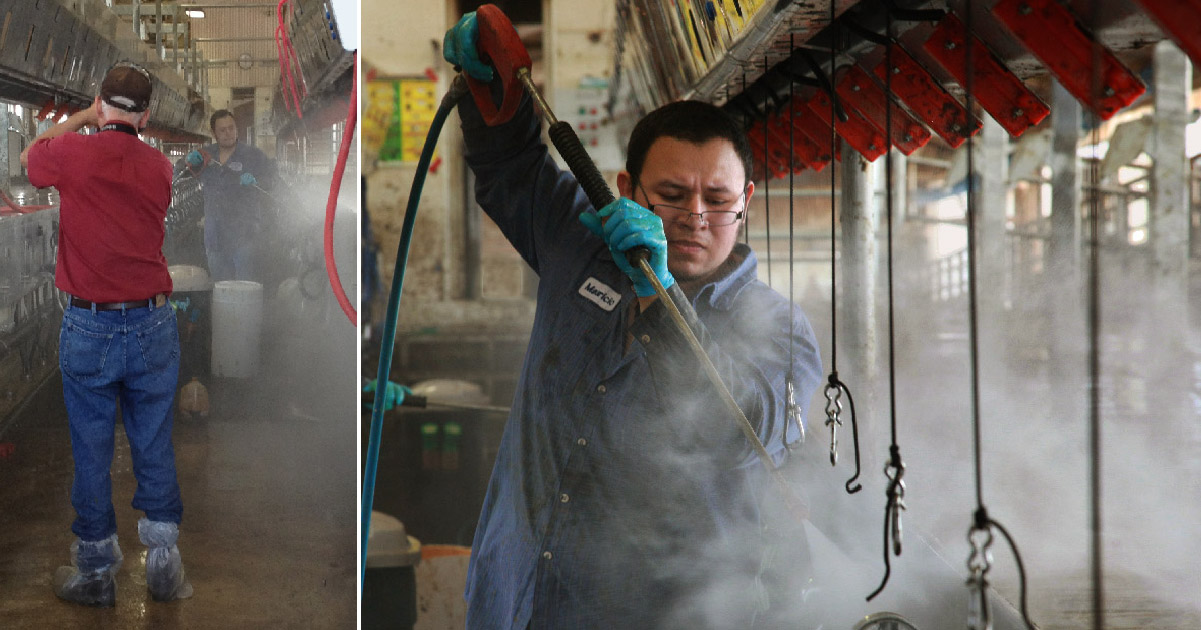 Earl Dotter takes a photo of a worker cleaning