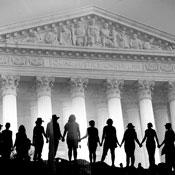 people holding hands in front of supreme court