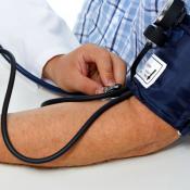 patient getting blood pressure checked