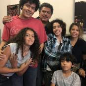 The Rodriguez family. Front row: Liliana, 13, and Alejandro, 10. Back row: Adria