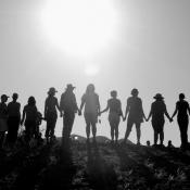 People standing together on hillside