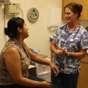 Patient talks with clinician