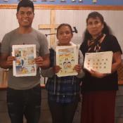 Photo of Farmworker parents after participating in a talk with a CHW