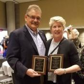 Sara Quandt and Tom Arcury Holding Alice Hamilton Award