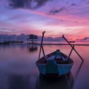 boat on the water at sunset