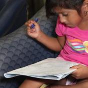 Girl writing in notebook