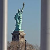 Statue of Liberty behind bars