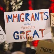 Protester holding up sign