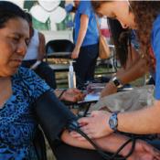 Woman being treated by clinician