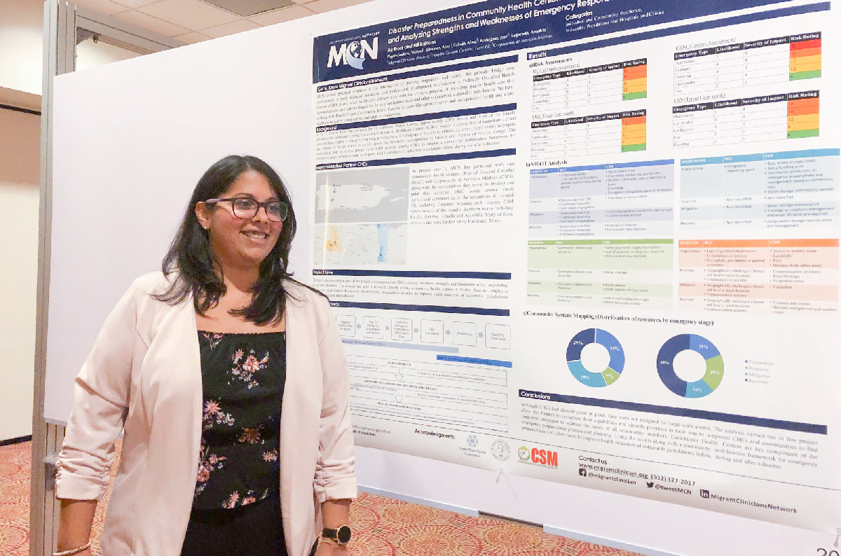 Marysel Pagán Santana poses with the poster she presented at the conference