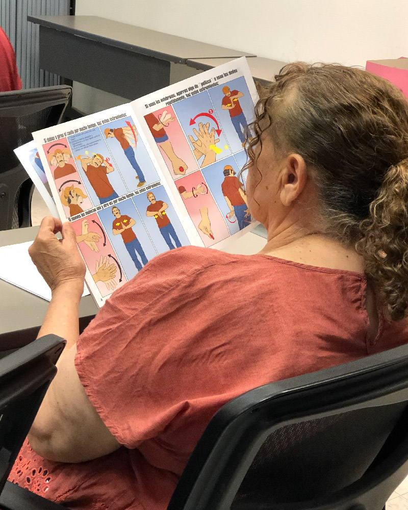 A training attendee looking over educational materials