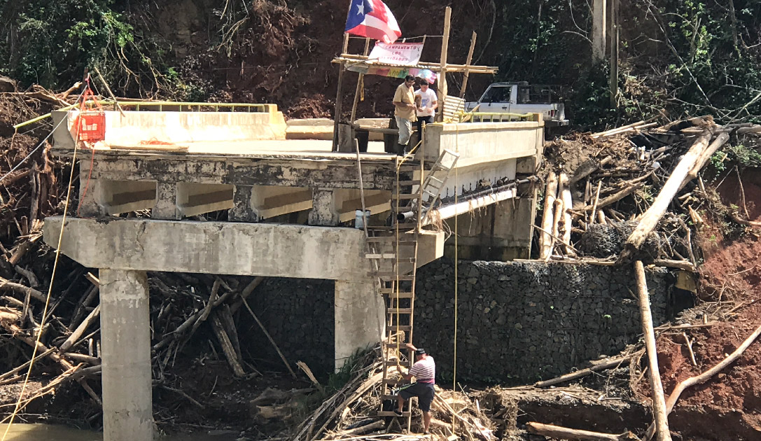 A bridge in Puerto Rico destroyed by Hurricane Maria