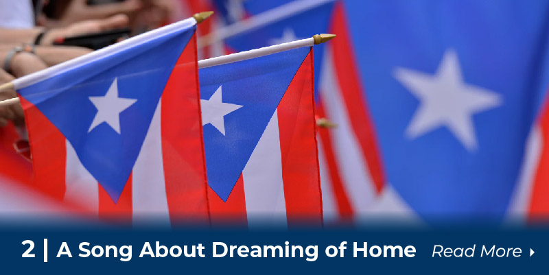 People holding Puerto Rican Flags