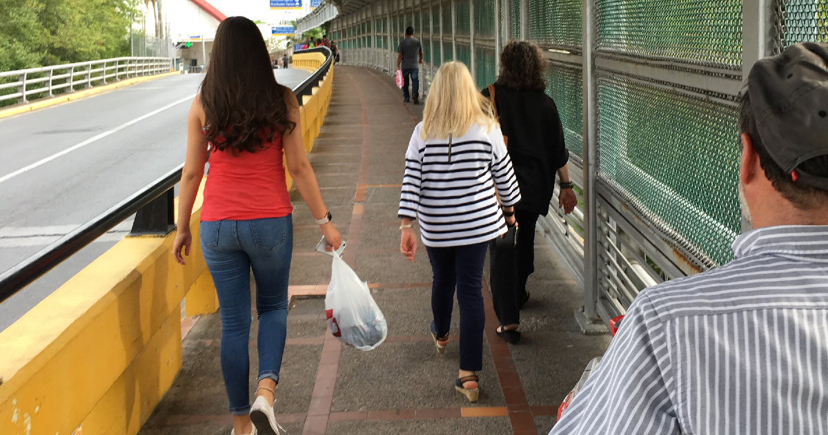 MCN CEO Karen Mountain and Board Member Marsha Griffin at the border