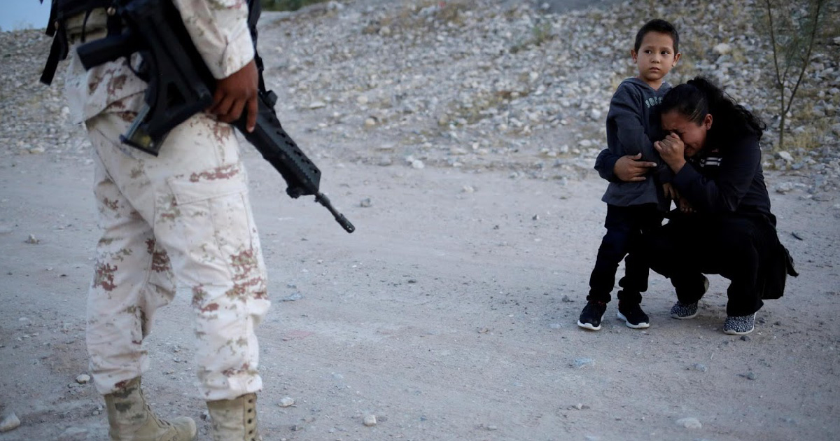 Guatemalan mother begs soldier to let her enter US