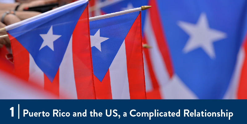 People holding Puerto Rican Flags