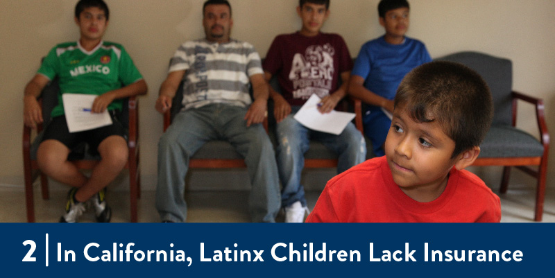 Boy waits with family in clinic waiting room