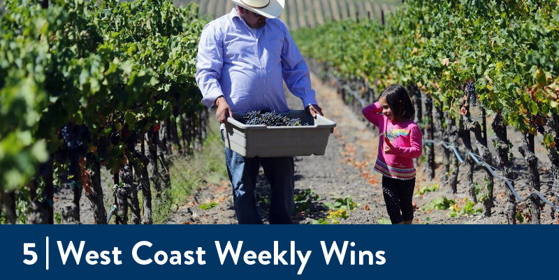 Vineyard owner walks with daughter