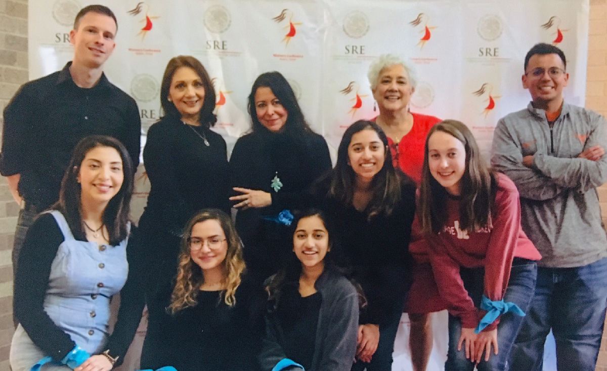 MCN Staff and Volunteers pose for photo at Women's Leadership Conference