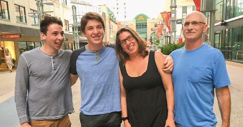 Amy Liebman poses for a photo with her family