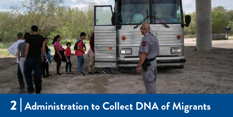 Migrants boarding a bus while a border patrol officer watches