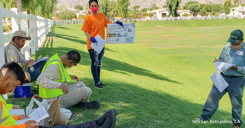 A CHW presents to workers