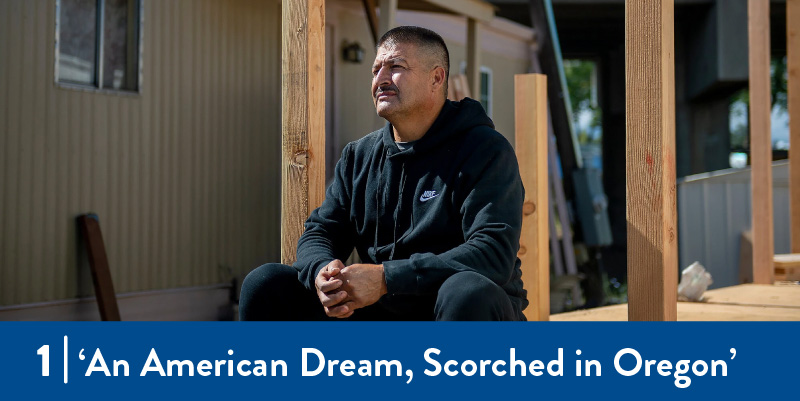 A farmworker sits in the shell of a home