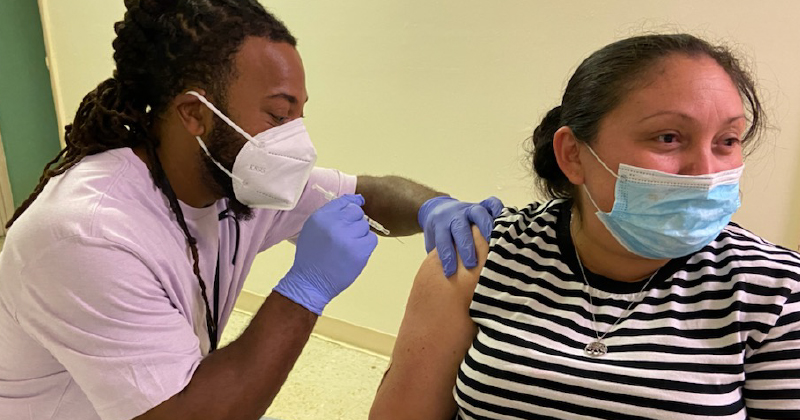 A person receiving a vaccination