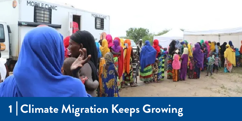 People wait outside mobile clinic