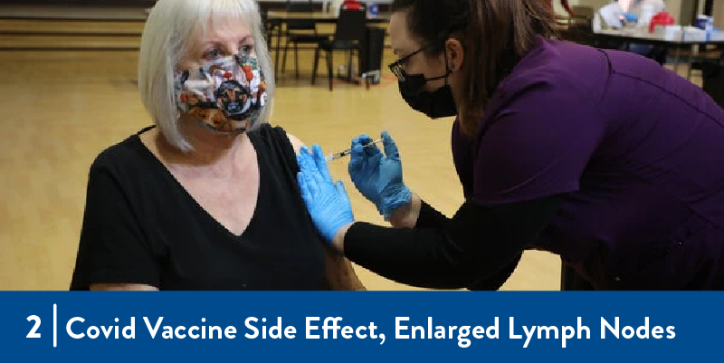 A woman receives the COVID-19 vaccine