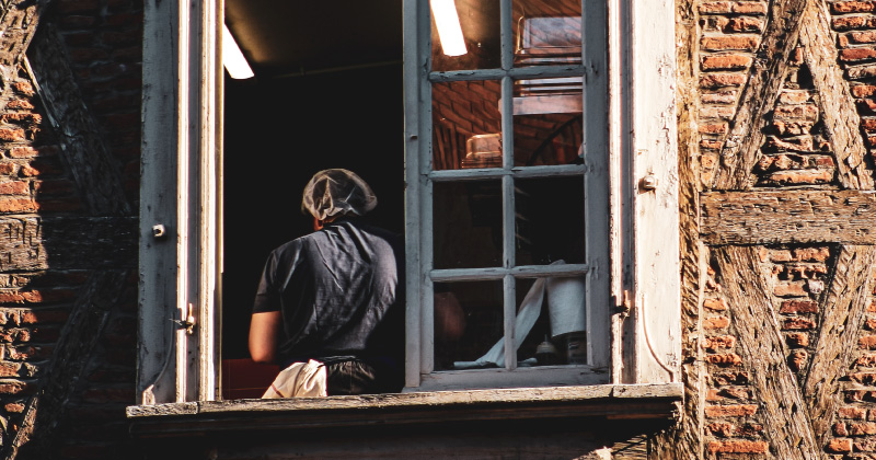 Person working with window open