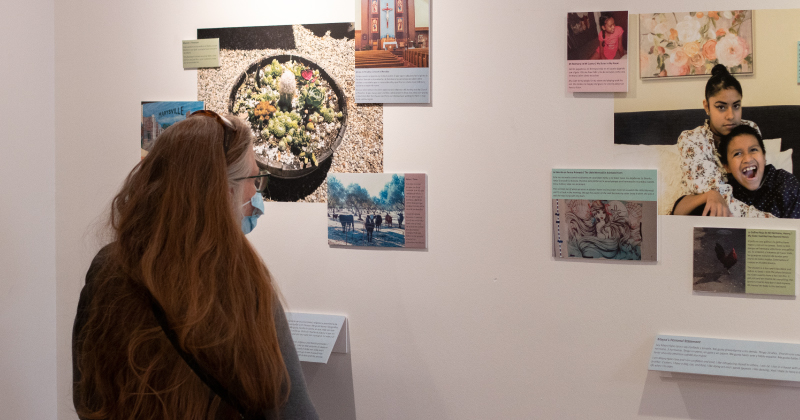 Attendees at the Photovoice Exhibit