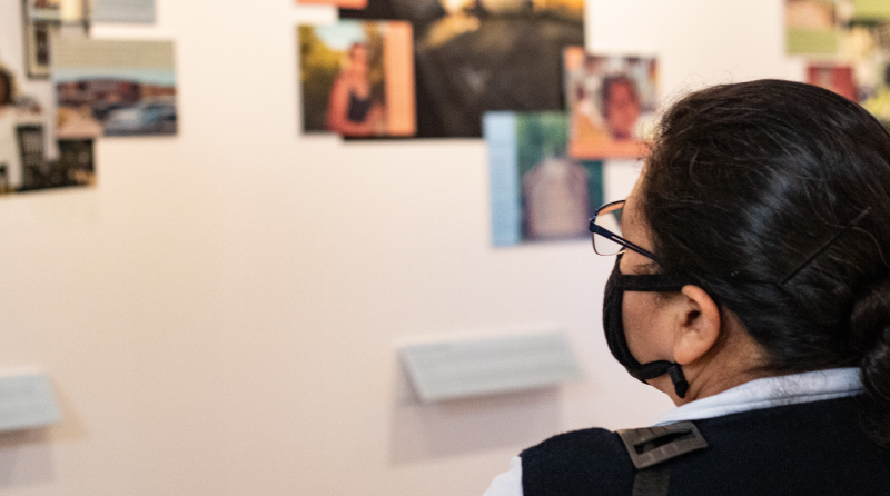 Attendees at the Photovoice Exhibit