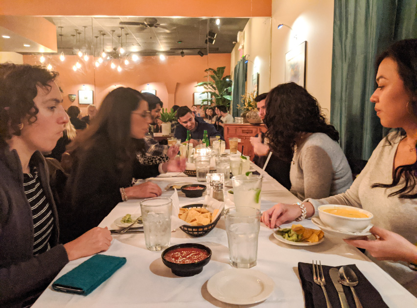 MCN staff gather for dinner after the first day of meetings