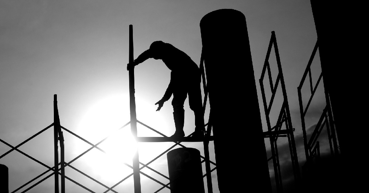 Construction worker on scaffolding