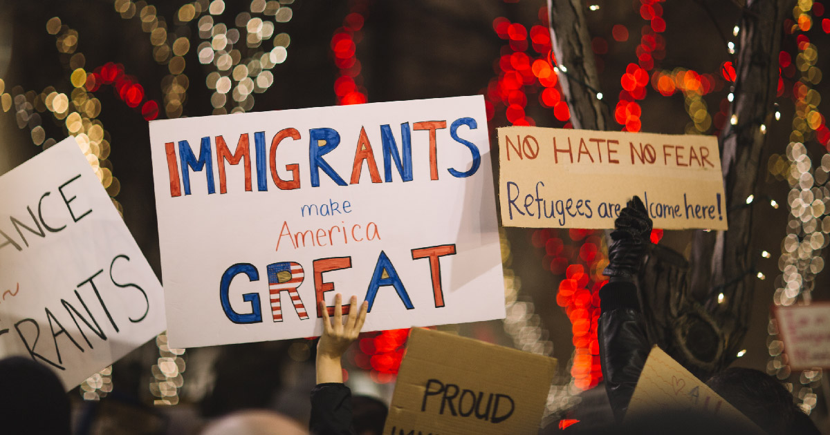 protester holding up sign