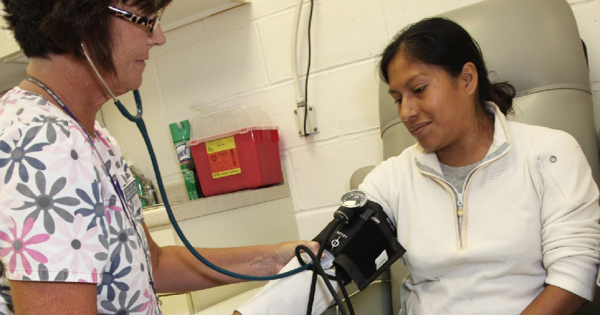 Woman receives treatment at clinic