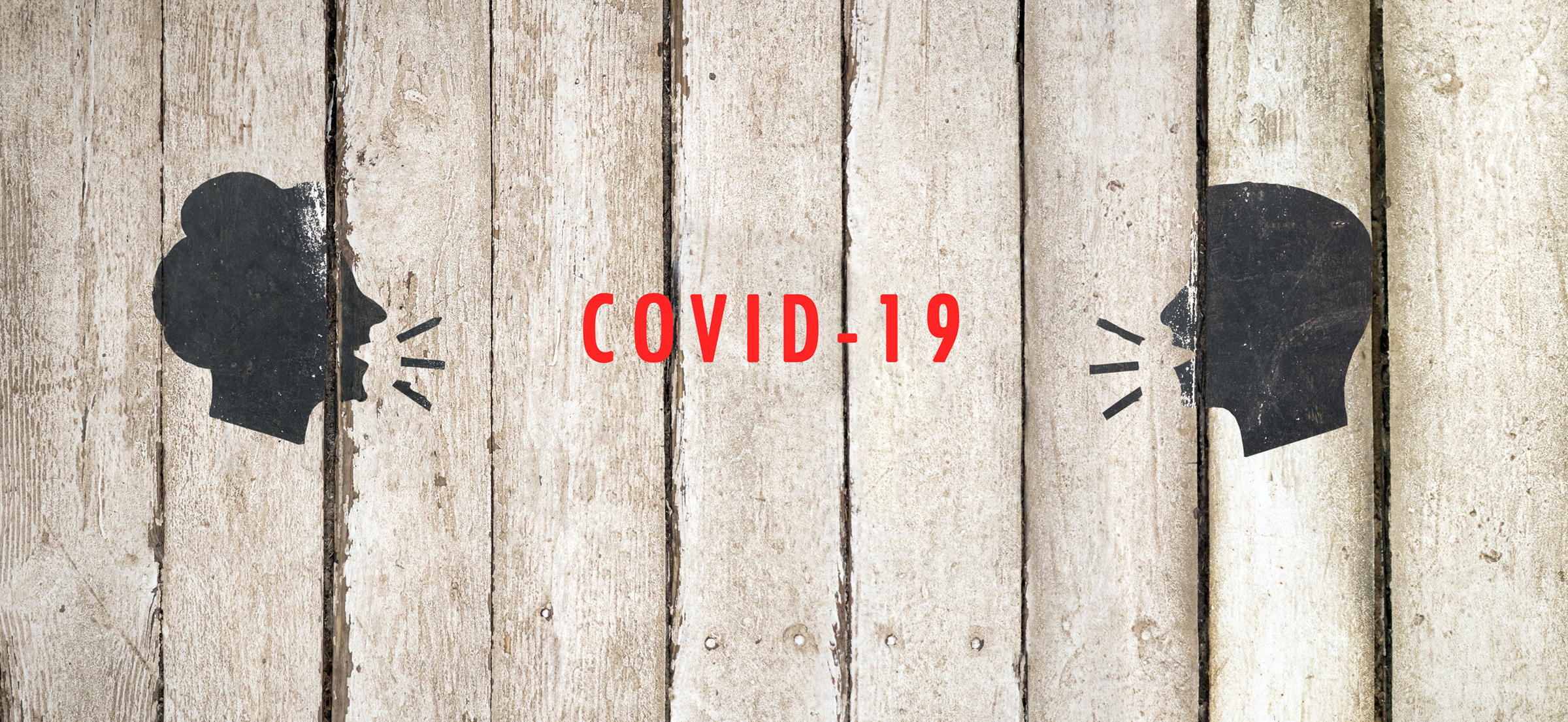 Cutout of two people talking to each other over COVID-19 lettering