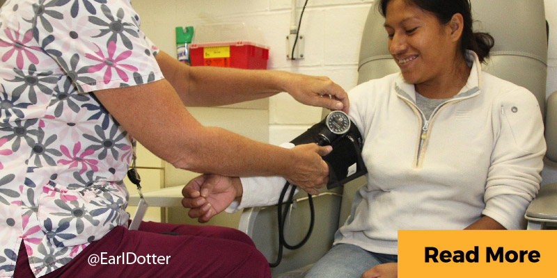 Woman getting blood pressure taken