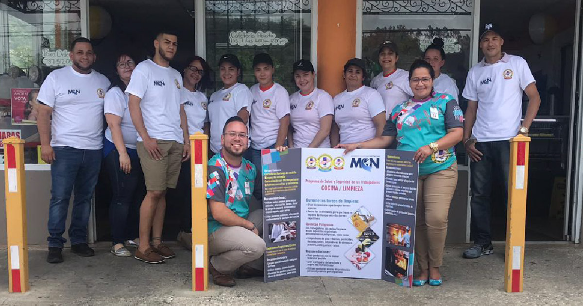 Jayuya Outreach team outside of business