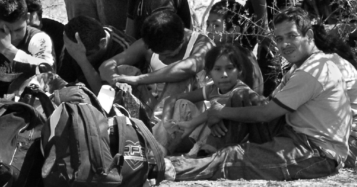 child and father at border